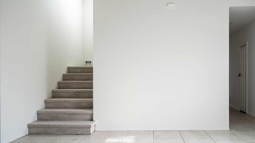 Monte-escalier tournant installé dans une maison à Saint-Galmier