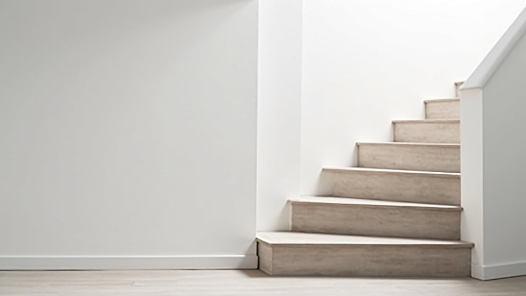 Monte-escalier tournant installé dans une maison avec virage à Limeray