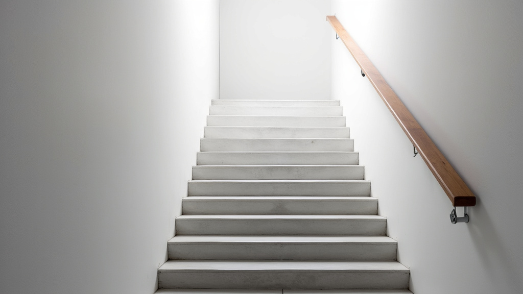 Monte-escalier tournant installé sur un escalier en colimaçon à Huillé-Lézigné